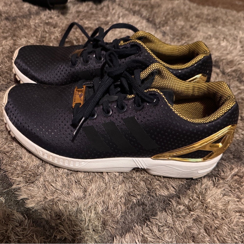 Adidas Women's Black and Gold Sneakers